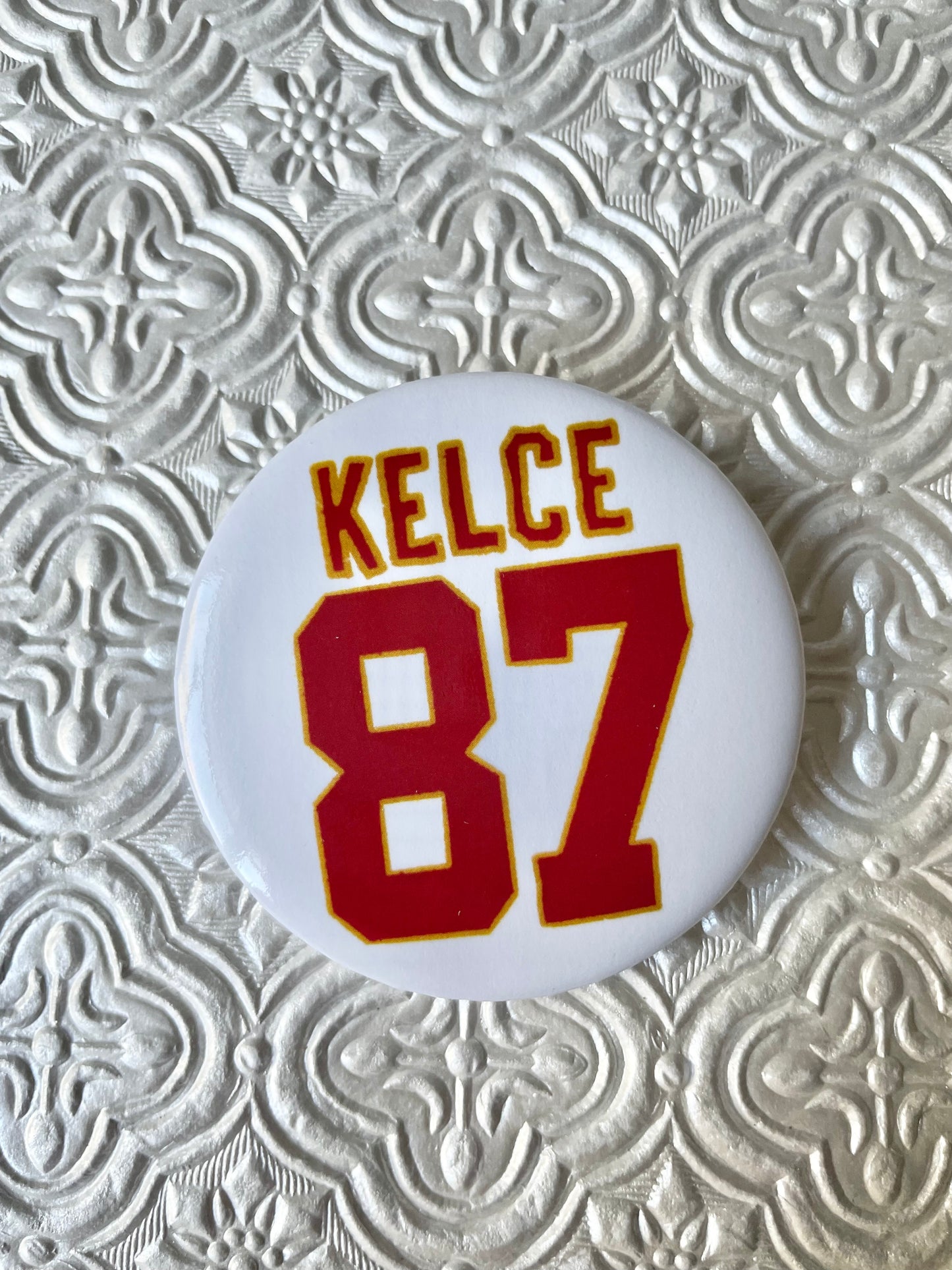Kelce Button
