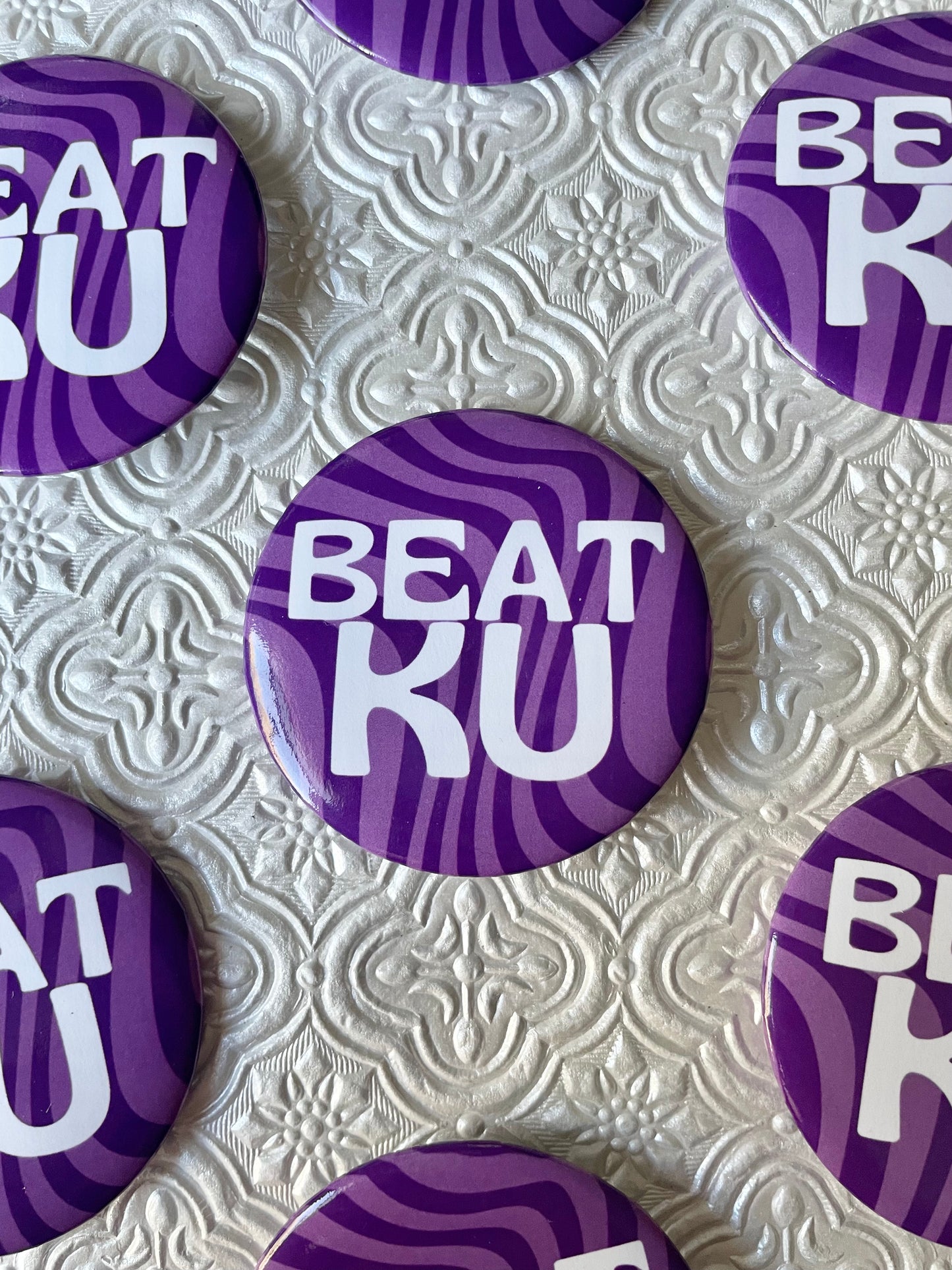 Beat KU Button